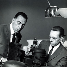 Achille and Pier Castiglioni with their Arco Lamp.