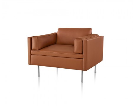 The Herman Miller Bolster Club Chair, named after bolster cushions-long, supportive, horizontal pillows-is available in fabric and leather.