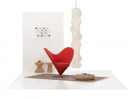 Classic Vitra! Verner Panton's Heart Cone Chair, designed in 1959, is a variant on his 1958 Cone Chair. There is also a Cone Stool to put your feet up on.