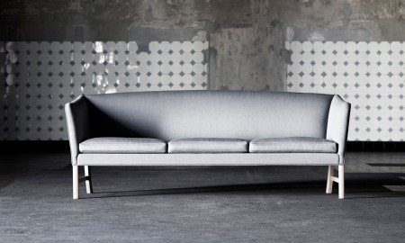 The Carl Hansen OW603 Sofa, designed by Ole Wanscher, is a Danish design classic redolent of both English and Oriental furniture. The sofas are handmade over a frame of beech and have upholstered, reversible cushions. Upholstered in fabric or leather and available as 2 or 3 seater.