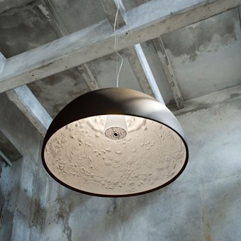 The Skygarden Suspension Light, designed by Marcel Wanders, 2007, is like a fabulous antique decorated plaster ceiling. It is available in 2 sizes and 4 finishes.