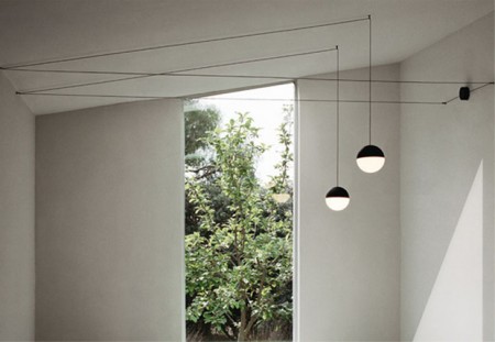 Winner of the 2014 prestigious EDIDA Award in the Lighting category, FLOS' String Lights by Michael Anastassiades is a beauty. It comes with 12 or 22 meters of cable so you can "string" it around your space!