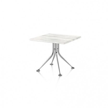 Available in luxurious black or white marble set atop polished die-cast aluminum legs, the Girard Splayed Leg Table offers a modernist take on old world charm.