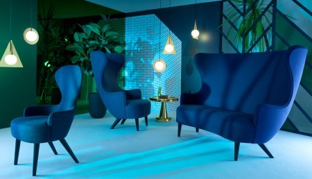 The Tom Dixon Wingback Collection of seating is available in a very highly curated collection of fabrics and a choice of black or copper legs.