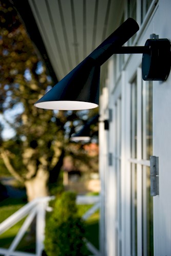 The Louis Poulsen AJ Lighting fixture is available in three finish options: black, natural aluminum and white.