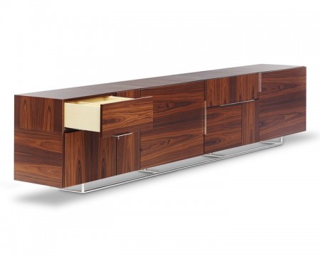 Isay Weinfeld's Domino Storage is comprised of an array of rectangular modules that are smartly edited to reflect the basic storage needs of today. Its spare, rectilinear form sets the stage for the exuberance of its quarter-turned wood fronts. Finished on all sides, the piece can serve anywhere in a room, and in settings formal or casual. The Geiger Domino Storage Credenza and Sideboard comes in a huge variety of options and finishes.