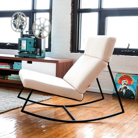 The Gus* version of the perfect modern rocking chair; featuring a black powder coated frame with architecturally-styled cushions inspired by airport lounge seating and 70's car interiors. Available in foour custom upholstery colours.