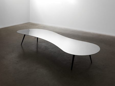 The exhibition at the Ben Brown Gallery includes such pieces as the Puddle 21, 2015, a signed and numbered table with a mirror polished stainless steel top. 