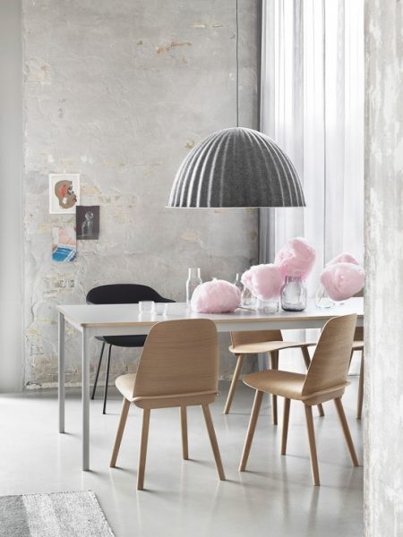 UNDER THE BELL is a large lamp that creates a new space within a space whether hung over the dining room table or on the ceiling. Its eye-catching design can also help to absorb noise and improve the acoustics in large rooms. Designed by Iskos-Berlin, UNDER THE BELL creates a sense of shelter and adds a strong statement to any setting.