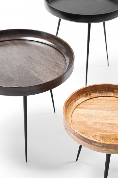 The Mater Bowl Table reconciles Indian craftsmanship with the simplicity of Scandinavian design. The Bowl Table's top is made from the wood of the mango fruit tree, harvested once the productive life of the tree is over. The wood top is turned manually on the lathe, showcasing the skill of the  "kharaadi", the local Indian wood turning community. The finishing is done with lead free water-based PU lacquers, thereby respecting the local environment.
