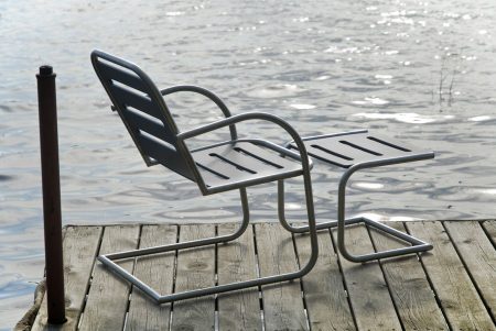 Inspired by the ubiquitous  "motel" chair from the 1940’s, Pliny the Lounger is a timely update on this classic. Designed and manufactured by Loll Designs with Sielaff Corporation using sustainable materials, a stainless steel frame is married to Loll’s 100% recycled and recyclable high-density polyethylene. Pliny features an elegantly mandrel bent 1" tubular stainless steel frame with poly seat and back. The welded tube frame has no open ends and is a one- piece construction that will last a lifetime. The Pliny has that classic  "bounce" feel that brings the seated back to a moment in their familiar past, but the chairs’ new roots are clearly in the present. The Pliny Ottoman accompanies the chair and can double as a side table or stool. 